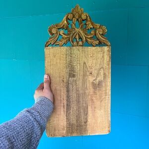 Ornate wooden charcuterie board